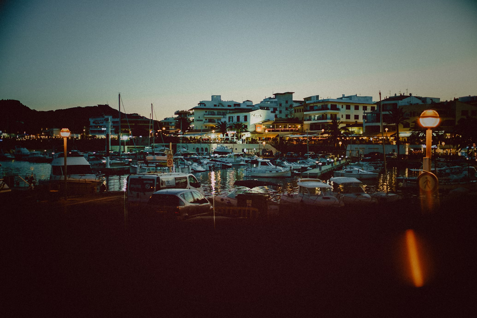 Mallorca at night with illuminated waterfront, reflecting the island’s status as one of Spain’s most popular holiday destinations. 