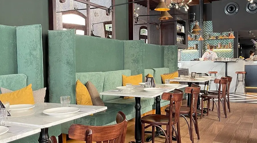 Interior of Andana restaurant in Palma, Mallorca, featuring contemporary Mediterranean dining space and open kitchen.