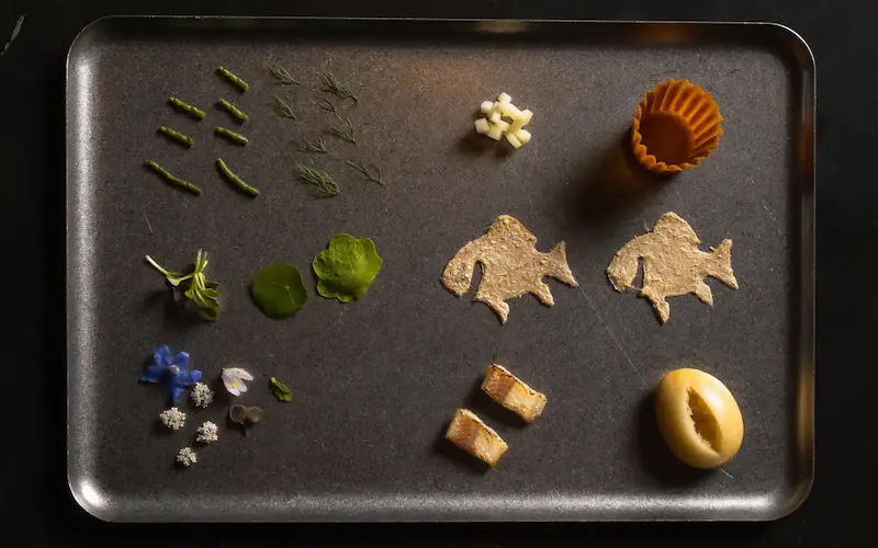 Course presentation from Fusion19 restaurant in Playa de Muro, Mallorca, showcasing contemporary fine dining and a multi-course chef-led menu.